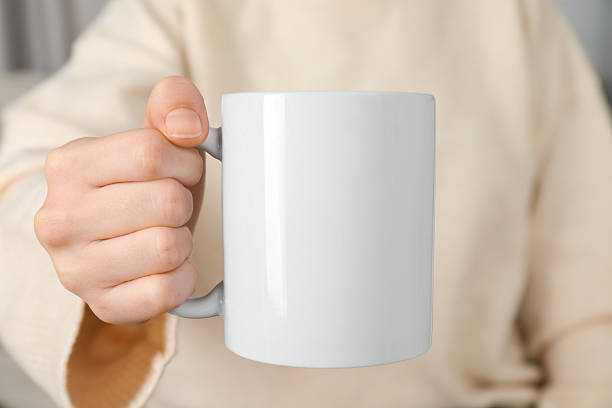 istock Woman with white ceramic cup, closeup. Mockup for design 2215790613