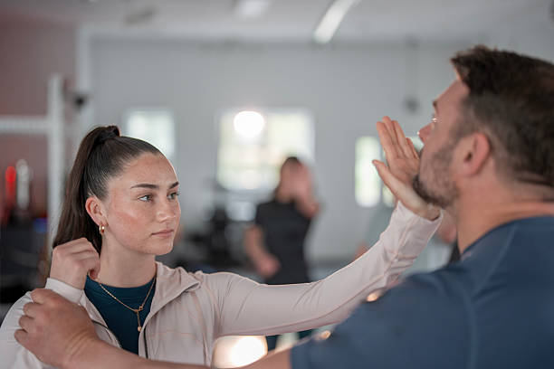 Women's Self-Defense Training Session With Instruction in Martial Arts Techniques