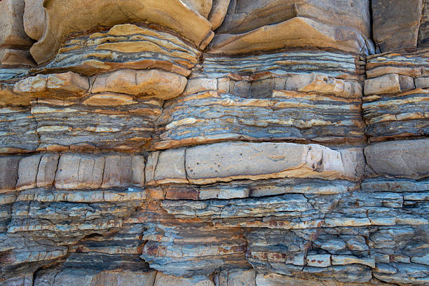 istock Tiilted layers of sandstone 2215803935