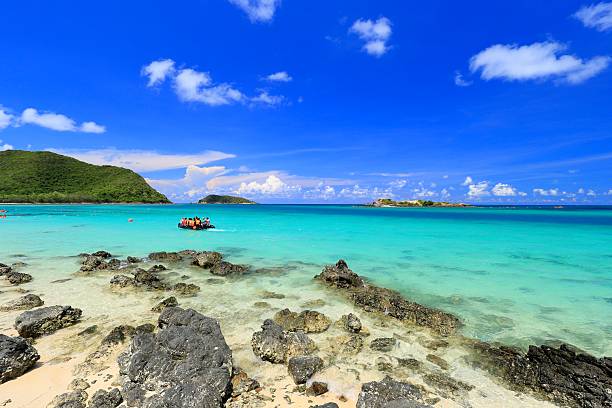 istock Beautiful Beach with Turquoise Color Water and Blue Sky 2215803987
