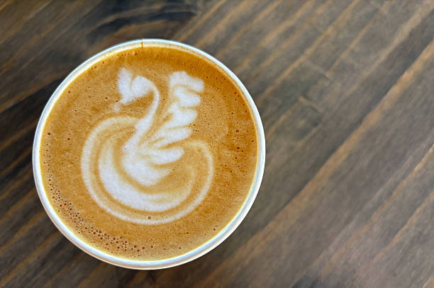Beautiful Latte with Froth Art, Wood Table, Copy Space
