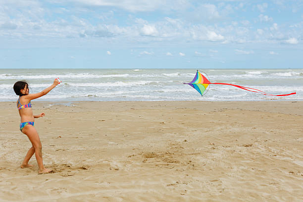 Tourists and locals celebrate the International Kite Festival on the Grandes Playas of Corralejo on Fuerteventura.