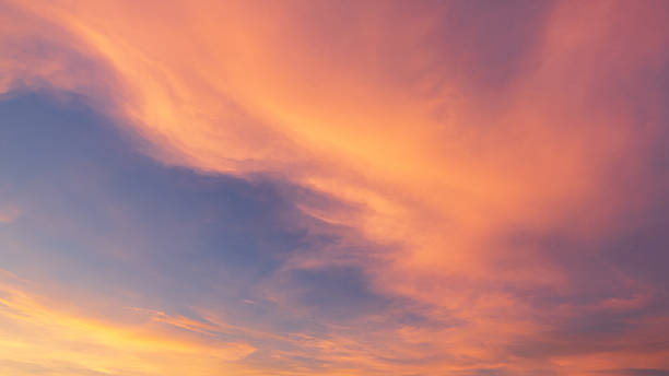 istock colorful clouds and sky background after sunset. 2215813275