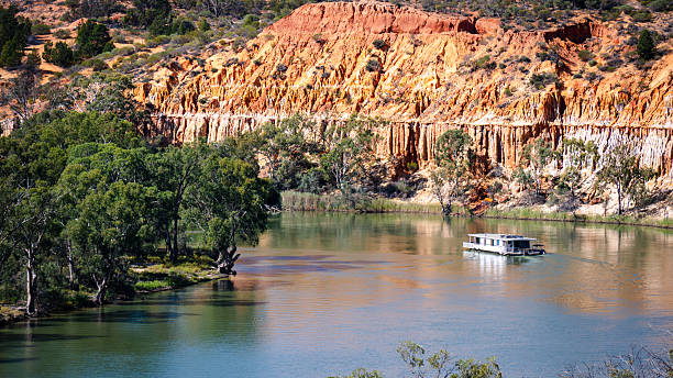 istock Houseboat Cruising the Murray River Below Headings Cliff Cliffs, Paringa, Murtho, South Australia 2215813353