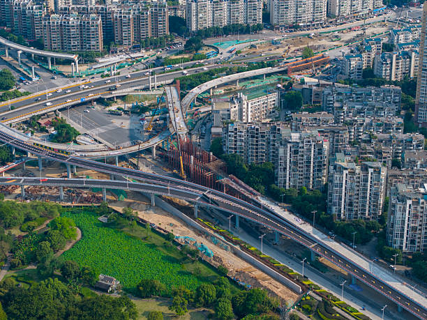 istock Urban Landscape with Elevated Highways and Residential Buildings 2215815579