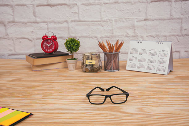 Office laptop business financial document chart and graph on wooden table with coffee cup. Flat lay notebook computer laptop office desk. No people business graph chart mockup on business workspace