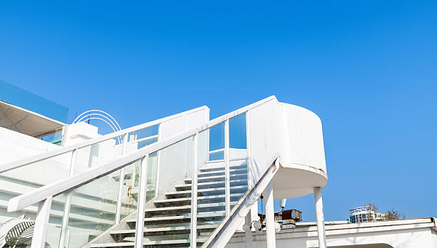 istock Metal staircase with glass railing 2215827171