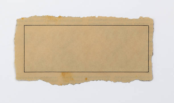 istock Piece of newspaper sheet with graphic frame on white background 2215827238
