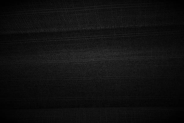 istock Blank empty plain dark gray black textured scratched wooden mica plywood board or black board or woven fabric textile vector background with copy space like cotton, muslin, linen or thick natural fibre backdrop 2215828020