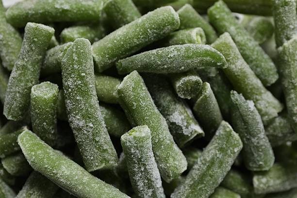 istock Frozen green beans as background, closeup view 2215829928