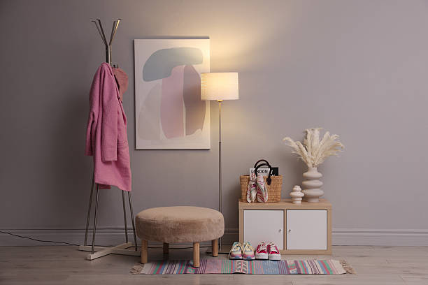 istock Stylish hallway interior with pouf and lamp 2215831407