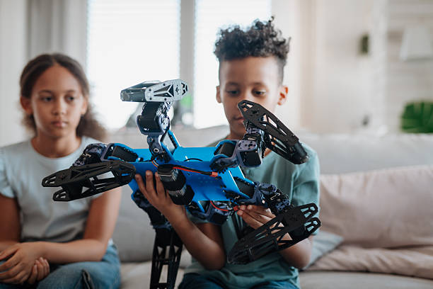 istock Kids playing with drone at home. 2215834564