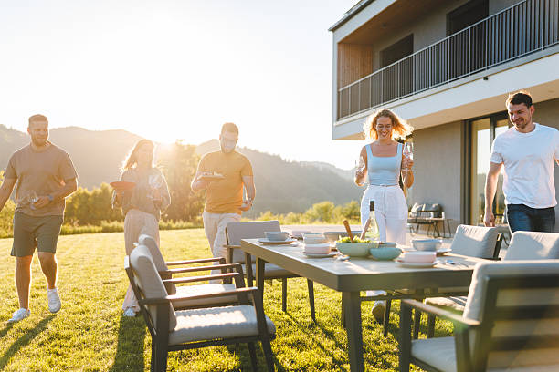istock Friends Enjoying Outdoor Late Lunch Gathering 2215836118