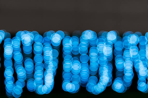 Defocused Christmas background with jingle bell.