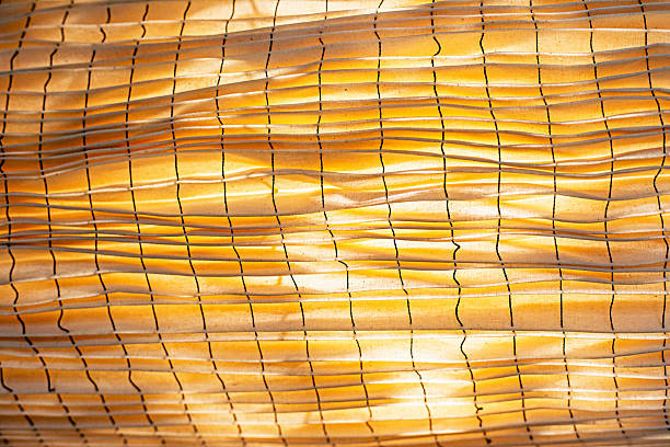 istock abstract background made of corrugated cardboard with backlight. lamps in the interior 2215837949