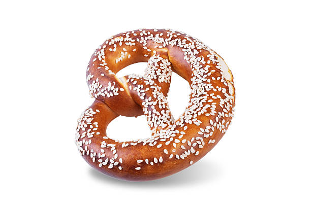 istock Pretzel with sesame seeds on a white isolated background 2215839322