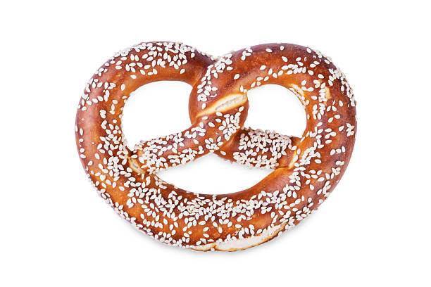 istock Pretzel with sesame seeds on a white isolated background 2215839324