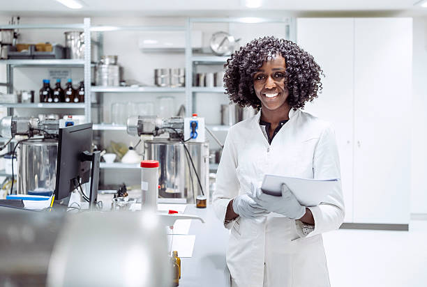 istock Confident Black Female Pharmacy Worker Holding Clipboard in Modern Laboratory Setting 2215841811
