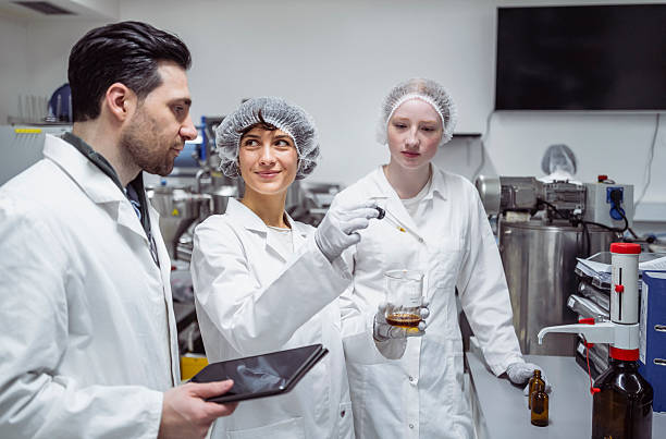 istock Pharmacy Workers Conducting Quality Control in a Laboratory with Bright Lighting and Modern Equipment 2215842322