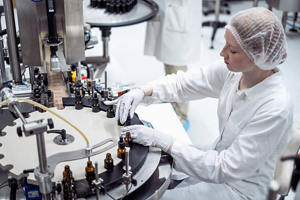 istock Caucasian Female Lab Worker Packaging Products and Ensuring Quality in a Modern Laboratory 2215843165
