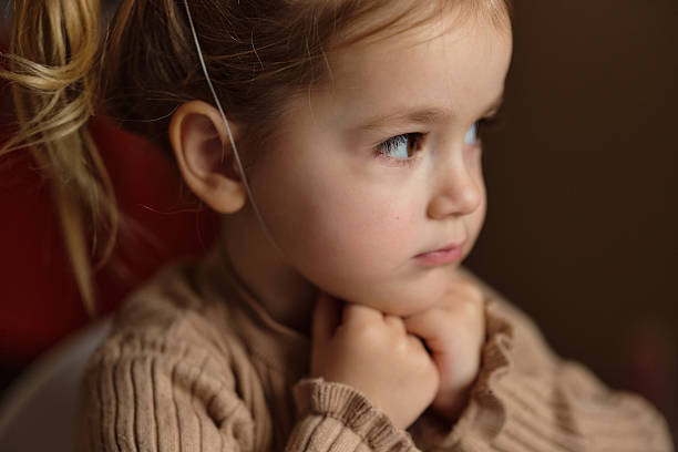 istock Cute little girl whit party hat 2215844622