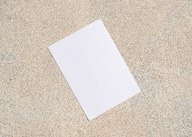 istock empty vertical paper poster mockup on concrete stone floor or pavement outdoors 2215846256