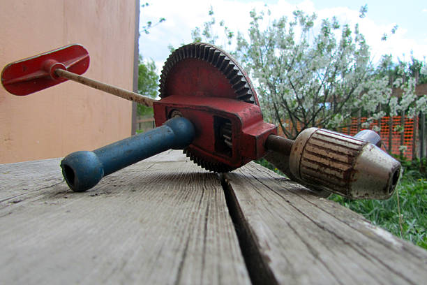 istock Vintage Hand Drill on a Wooden Surface 2215849968