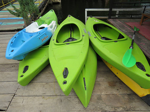 istock Green kayaks and oar in Kampt, Cambodia 2215850137