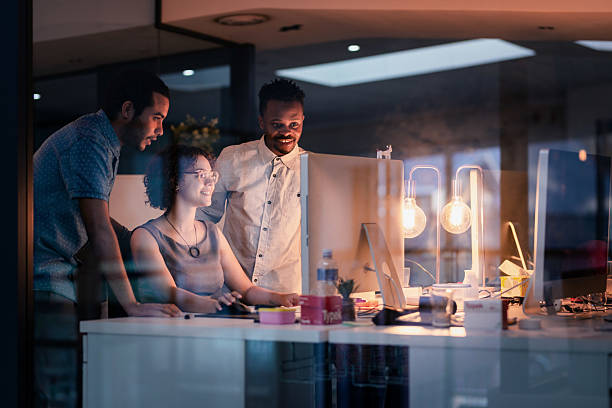istock Collaborative Teamwork During a Late-Night Business Meeting in a Modern Office Environment 2215851478
