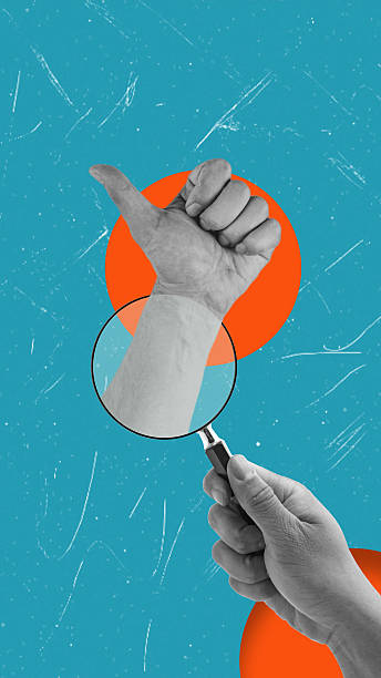 istock Modern art collage featuring a hand with a magnifying glass and thumb up on a blue background. 2215852498