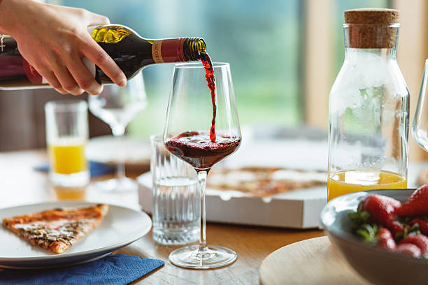 istock Friends Sharing Pizza and Laughs at Home 2215853674