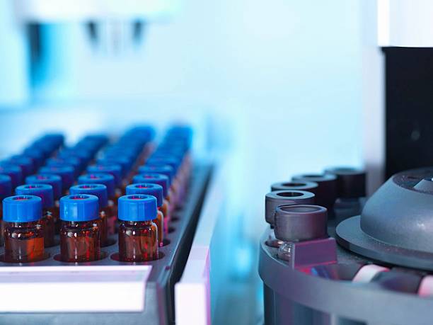 istock Robotic arm in a laboratory setting precisely moving vials for scientific analysis and experiments. Gas chromatography. 2215854749