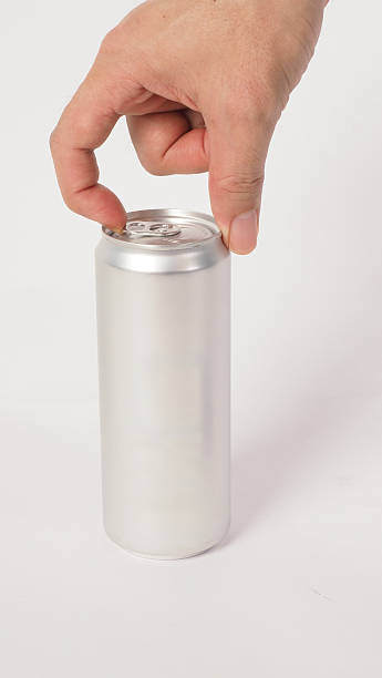 istock Hand opening a silver aluminum can on white background.Side view 2215855731