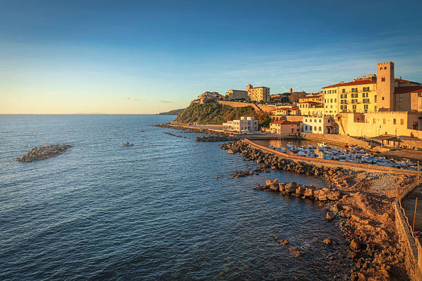 istock Sunset over Piombino seafront. Tuscany, Italy 2215856220