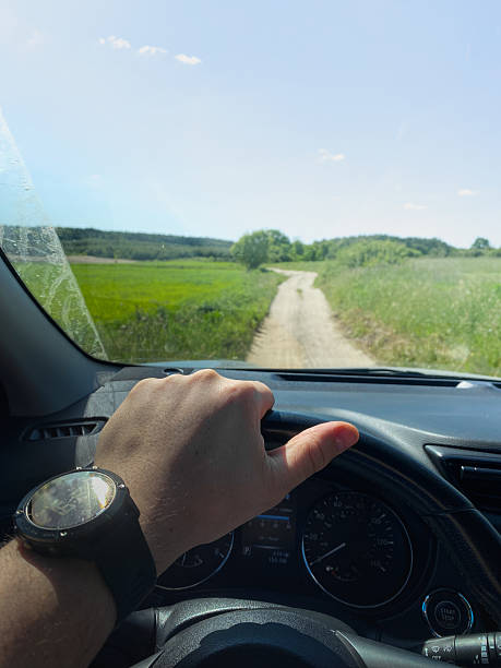 istock Driving on a Scenic Rural Dirt Road 2215861452