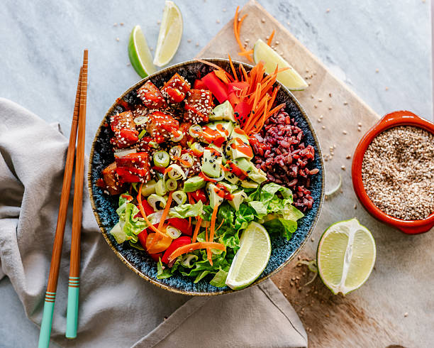 istock Salad bowl with red rice and roasted tofu 2215864481