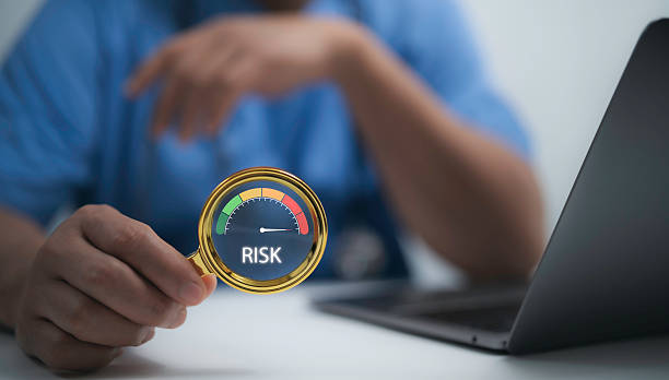 istock Doctor analyzing healthcare risk assessment, representing predictive analysis and strategic planning in the medical field. Ensuring safety, compliance and decision-making for future security 2215868012