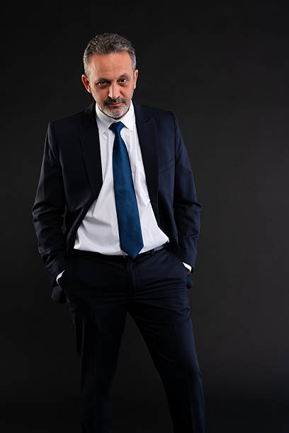 istock Confident businessman with hands in pockets 2215877749