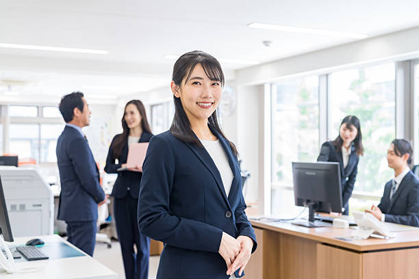 istock business woman working in the office 2215879173
