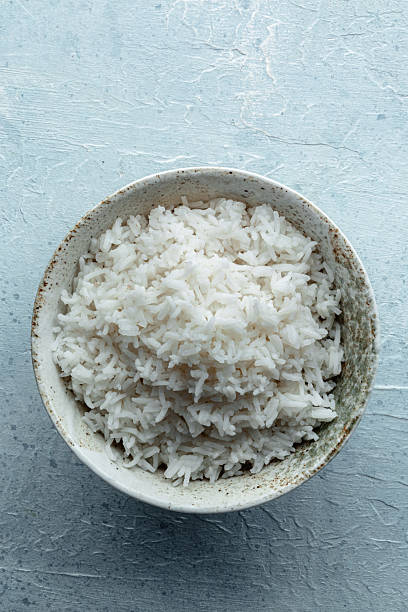 istock White rice, cooked. A bowl of boiled long grain rice, a simple side dish 2215881580