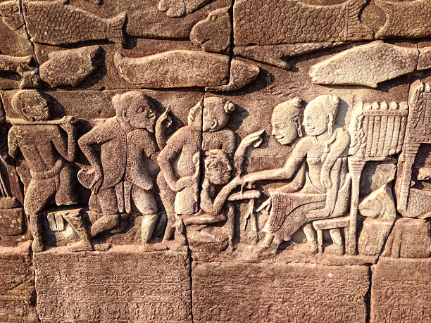 Siem Reap, Cambodia- February 2, 2014: Angkor Wat is a temple complex in the province of Siem Reap, Cambodia originally dedicated to the Hindu god Vishnu in the 12th century CE. It is among the largest religious buildings ever created. Its name means \