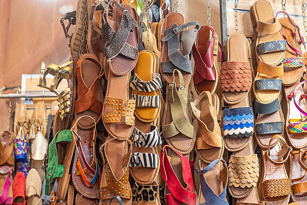 istock Traditional handmade leather sandals are displayed for sale in a bustling souk in marrakech, morocco 2215895620
