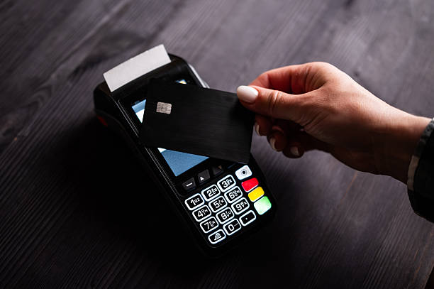 Girl Paying By Credit Card With Wireless Pos Terminal