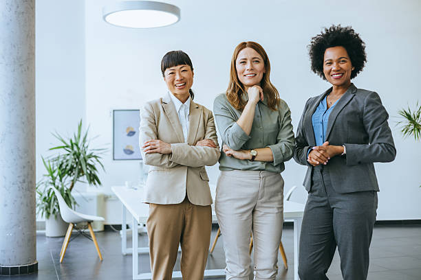 istock Diverse team of professionals posing together 2215896613