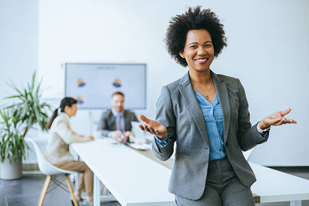 istock Engaged employee interacting with business team 2215896617