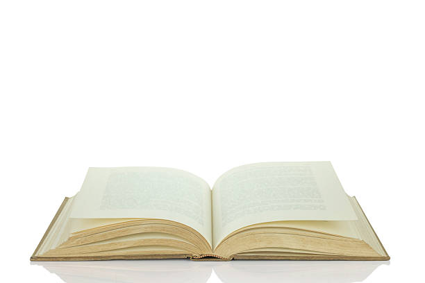 istock An old book is open isolated on white background with clipping path. 2215900372