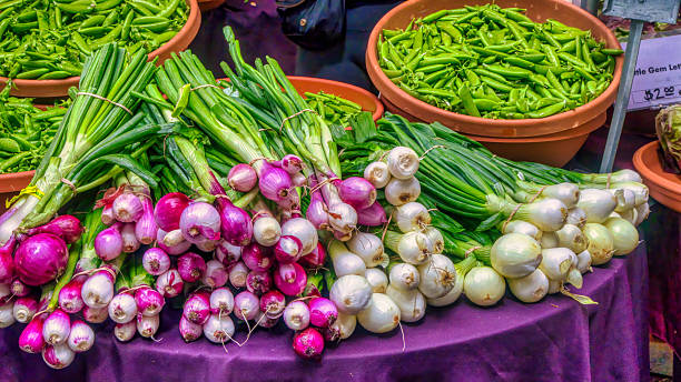 red and green spring onions and snap peas