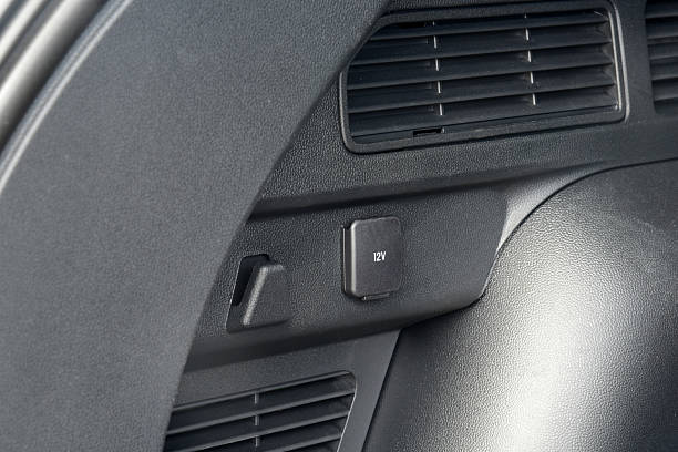 istock 12 Volts power outlet socket in the car 2215902222