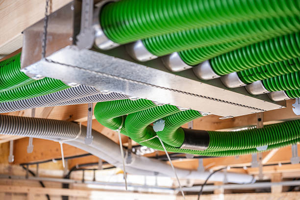 Colorful Ductwork Enhances Ventilation System in Modern Building Under Construction During Daylight Hours
