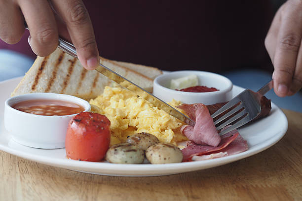 istock Preparing a hearty breakfast in a cozy restaurant 2215904910